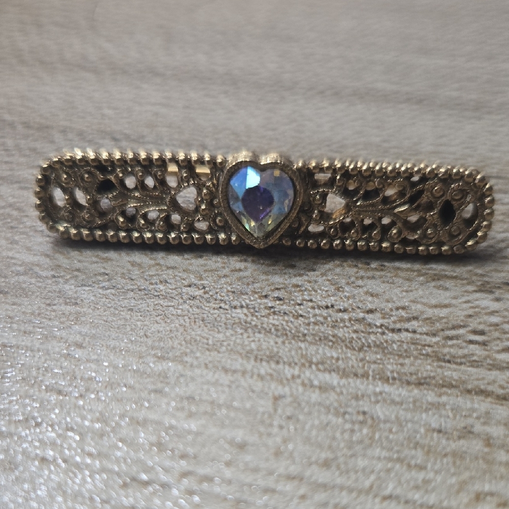 Vintage 1928 Gold Tone Bar Brooch with AB Heart Gemstone